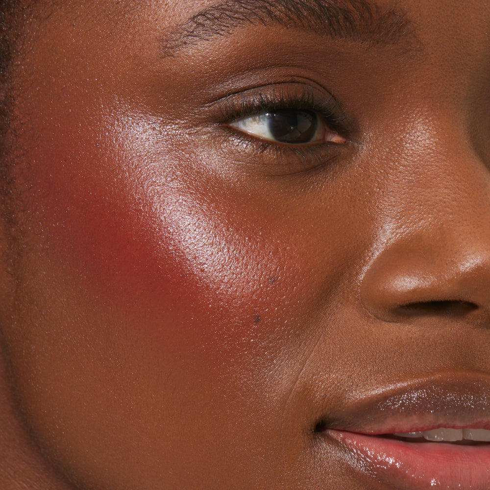 Finest Hour [A close up of a model with Tower 28 Beauty's BeachPlease Cream Blush in Finest Hour on her face.]